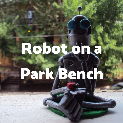 Robot on a Park Bench in Delmarva Review
